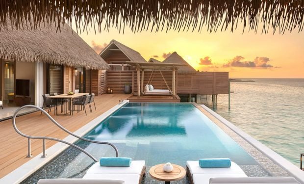 Overwater villa dusk 840x840